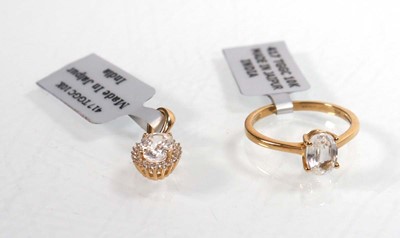 Lot 759 - A 9ct yellow gold ring set oval clear stone in...