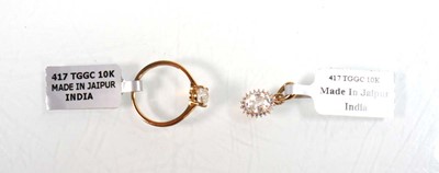 Lot 759 - A 9ct yellow gold ring set oval clear stone in...