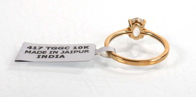 Lot 759 - A 9ct yellow gold ring set oval clear stone in...