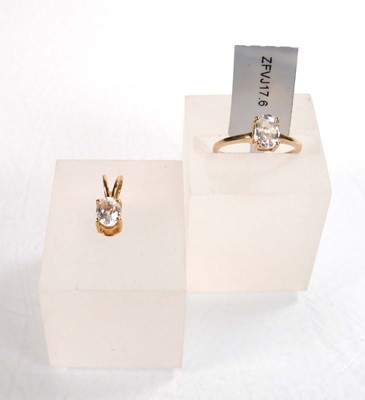 Lot 760 - A 9ct yellow gold ring set oval clear stone in...
