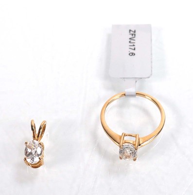 Lot 760 - A 9ct yellow gold ring set oval clear stone in...