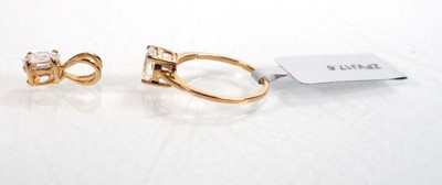 Lot 760 - A 9ct yellow gold ring set oval clear stone in...