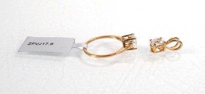 Lot 760 - A 9ct yellow gold ring set oval clear stone in...