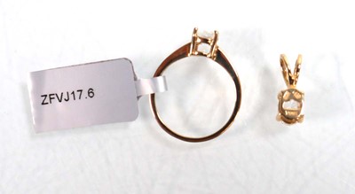 Lot 760 - A 9ct yellow gold ring set oval clear stone in...