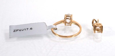 Lot 760 - A 9ct yellow gold ring set oval clear stone in...