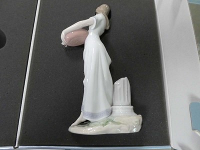Lot 2851 - 4 boxed Lladro figures, to include lady with...
