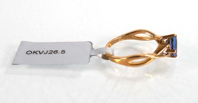 Lot 765 - A 14ct yellow gold ring set round tanzanite...