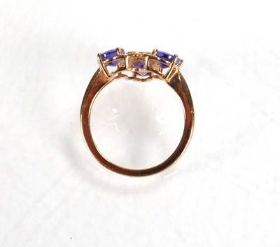 Lot 767 - A 9ct yellow gold ring set three oval...