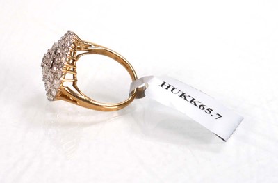 Lot 769 - A 9ct yellow gold ring set small diamonds in...