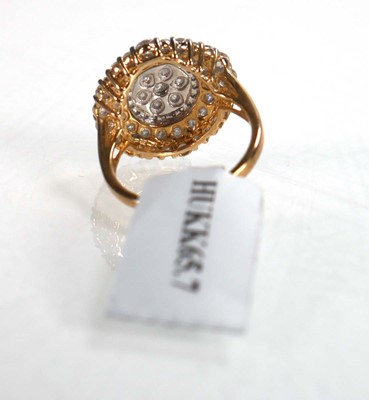Lot 769 - A 9ct yellow gold ring set small diamonds in...