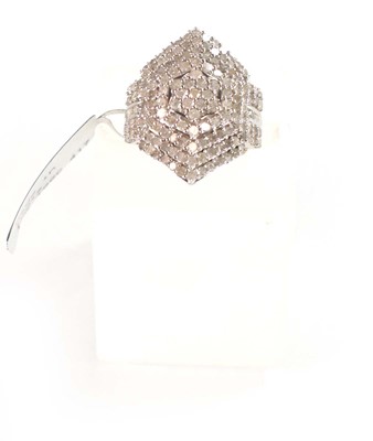 Lot 770 - A 9ct white gold ring set small diamonds in a...