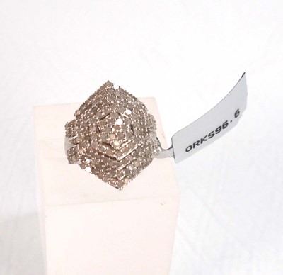 Lot 770 - A 9ct white gold ring set small diamonds in a...