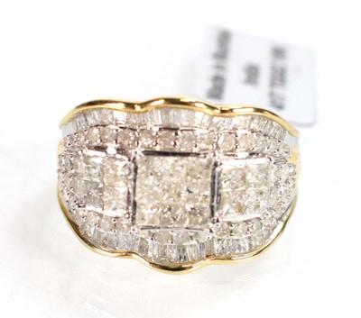 Lot 772 - A 9ct white gold ring set small brilliant,...