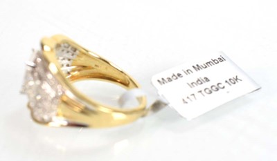 Lot 772 - A 9ct white gold ring set small brilliant,...