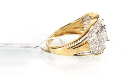 Lot 772 - A 9ct white gold ring set small brilliant,...
