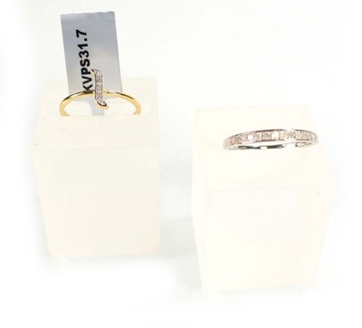 Lot 773 - A 9ct white gold half eternity ring set small...