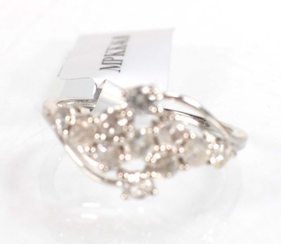 Lot 775 - A 9ct white gold crossover ring set small...
