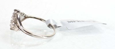 Lot 775 - A 9ct white gold crossover ring set small...