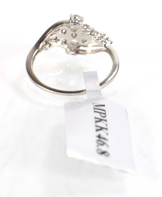 Lot 775 - A 9ct white gold crossover ring set small...