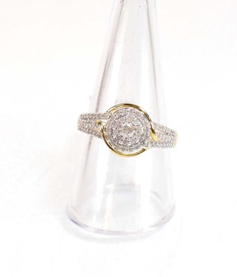 Lot 777 - A 9ct yellow gold ring set small diamonds in a...