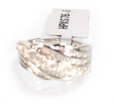 Lot 778 - A 9ct white gold crossover ring set small...