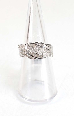 Lot 778 - A 9ct white gold crossover ring set small...