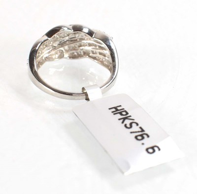 Lot 778 - A 9ct white gold crossover ring set small...