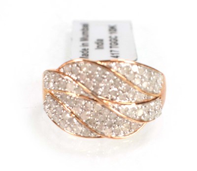 Lot 779 - A 9ct rose gold ring set small diamonds in a...