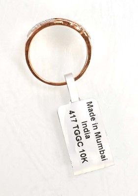 Lot 779 - A 9ct rose gold ring set small diamonds in a...