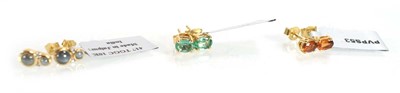 Lot 780 - Three pairs of 9ct yellow gold ear studs sets...