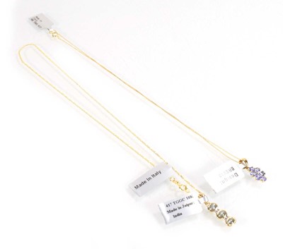 Lot 782 - A 9ct yellow gold pendant necklace set...