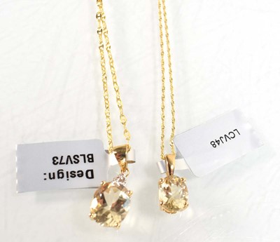 Lot 784 - Two 9ct yellow gold pendant necklaces, each...