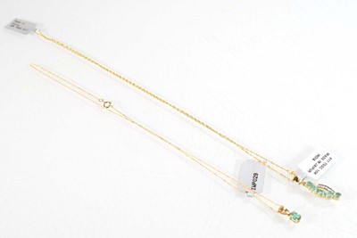 Lot 785 - Two 9ct yellow gold pendant necklaces, each...