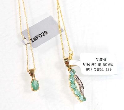 Lot 785 - Two 9ct yellow gold pendant necklaces, each...