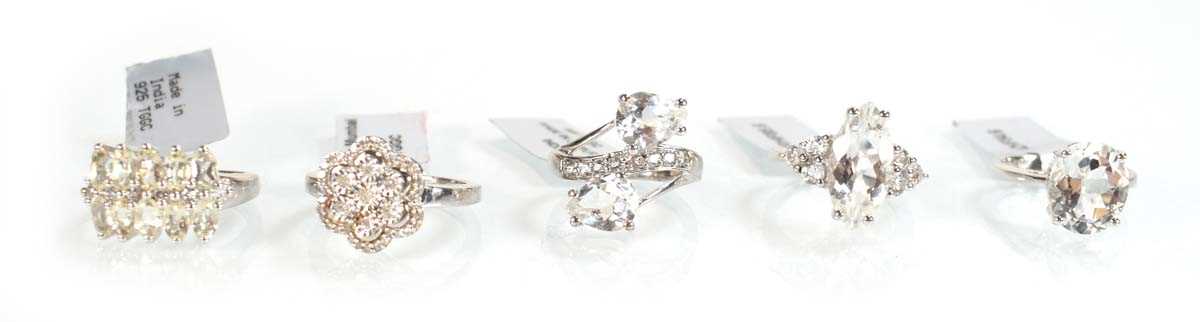 Lot 788 - Five silver dress rings set clear stones,...