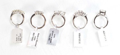 Lot 788 - Five silver dress rings set clear stones,...