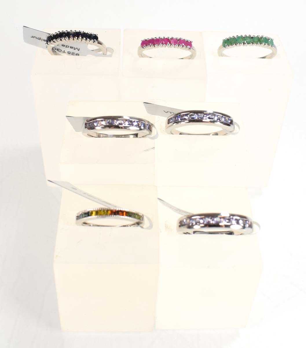 Lot 789 - Seven silver dress half eternity rings set...