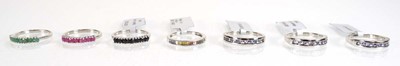 Lot 789 - Seven silver dress half eternity rings set...