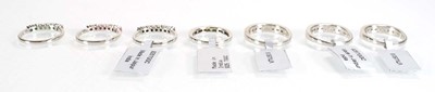 Lot 789 - Seven silver dress half eternity rings set...