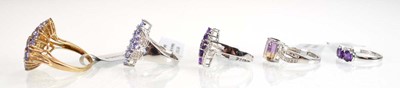 Lot 790 - Five silver dress rings set tanzanite coloured...