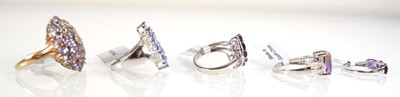 Lot 790 - Five silver dress rings set tanzanite coloured...