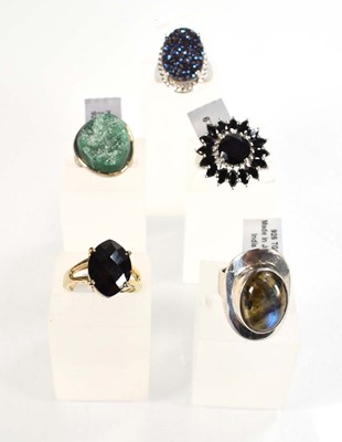 Lot 792 - Five silver dress rings set opaline, quartz...
