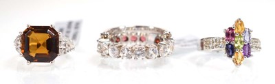 Lot 794 - Three silver dress rings set coloured stones,...