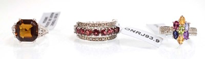 Lot 794 - Three silver dress rings set coloured stones,...