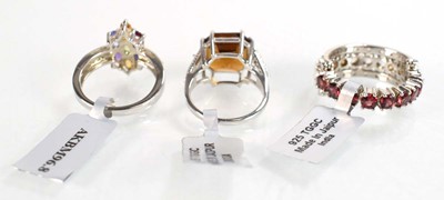 Lot 794 - Three silver dress rings set coloured stones,...