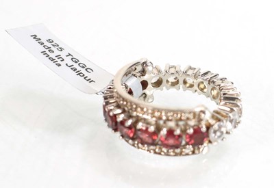 Lot 794 - Three silver dress rings set coloured stones,...