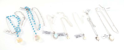 Lot 797 - Seven silver and metalware pendant necklaces...