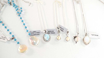 Lot 797 - Seven silver and metalware pendant necklaces...