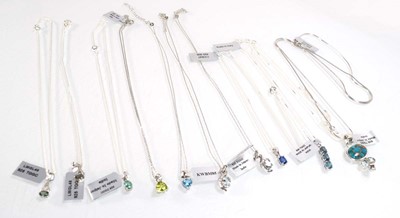 Lot 800 - Ten silver and metalware pendant necklaces set...