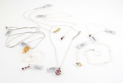 Lot 801 - Seven silver and metalware pendant necklaces...
